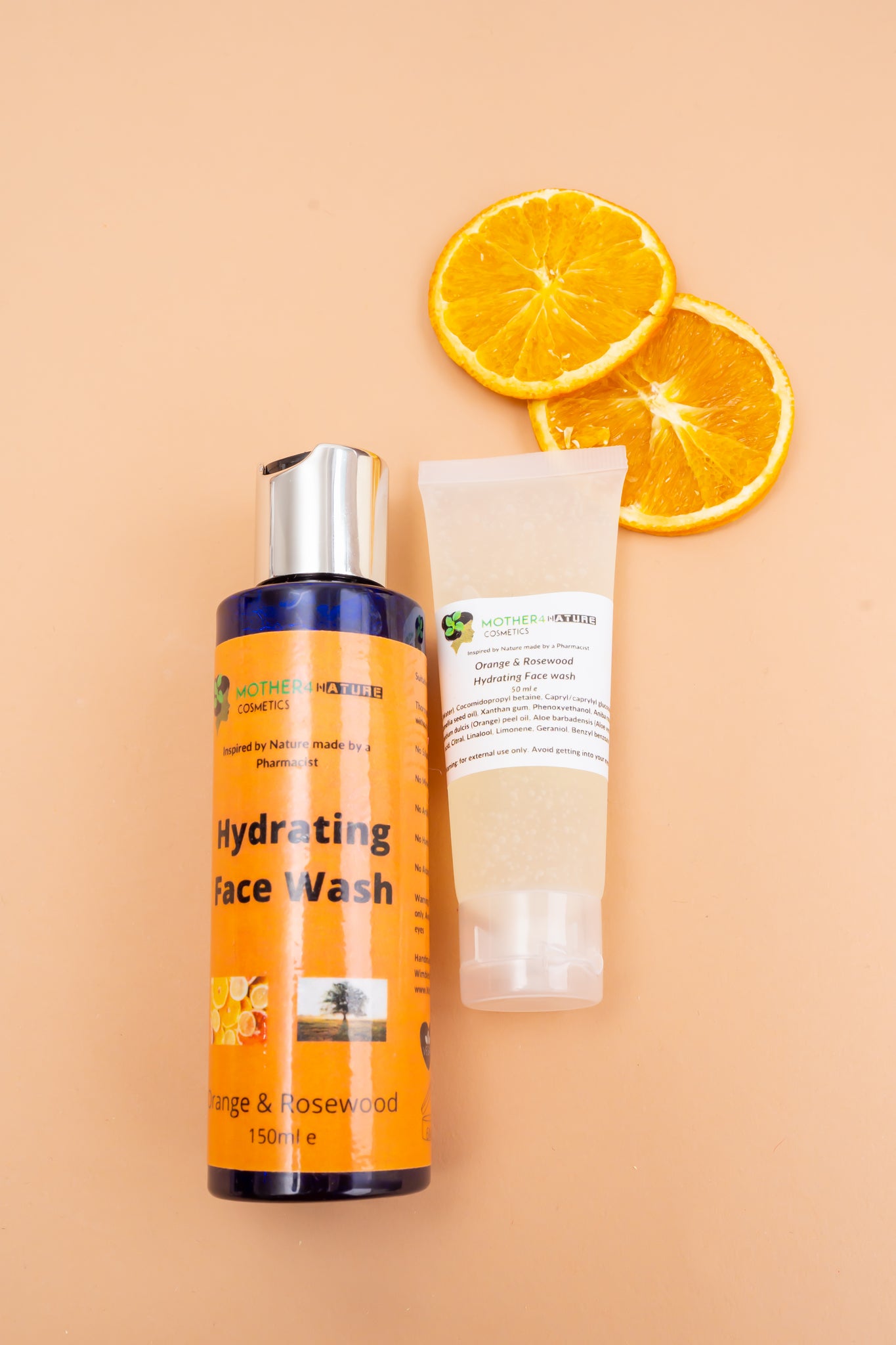 Different size facewash with orange slice